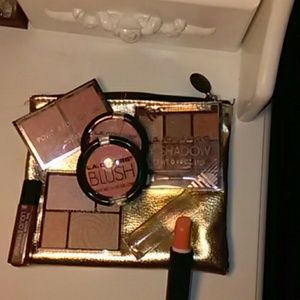 Gold bag with makeup included